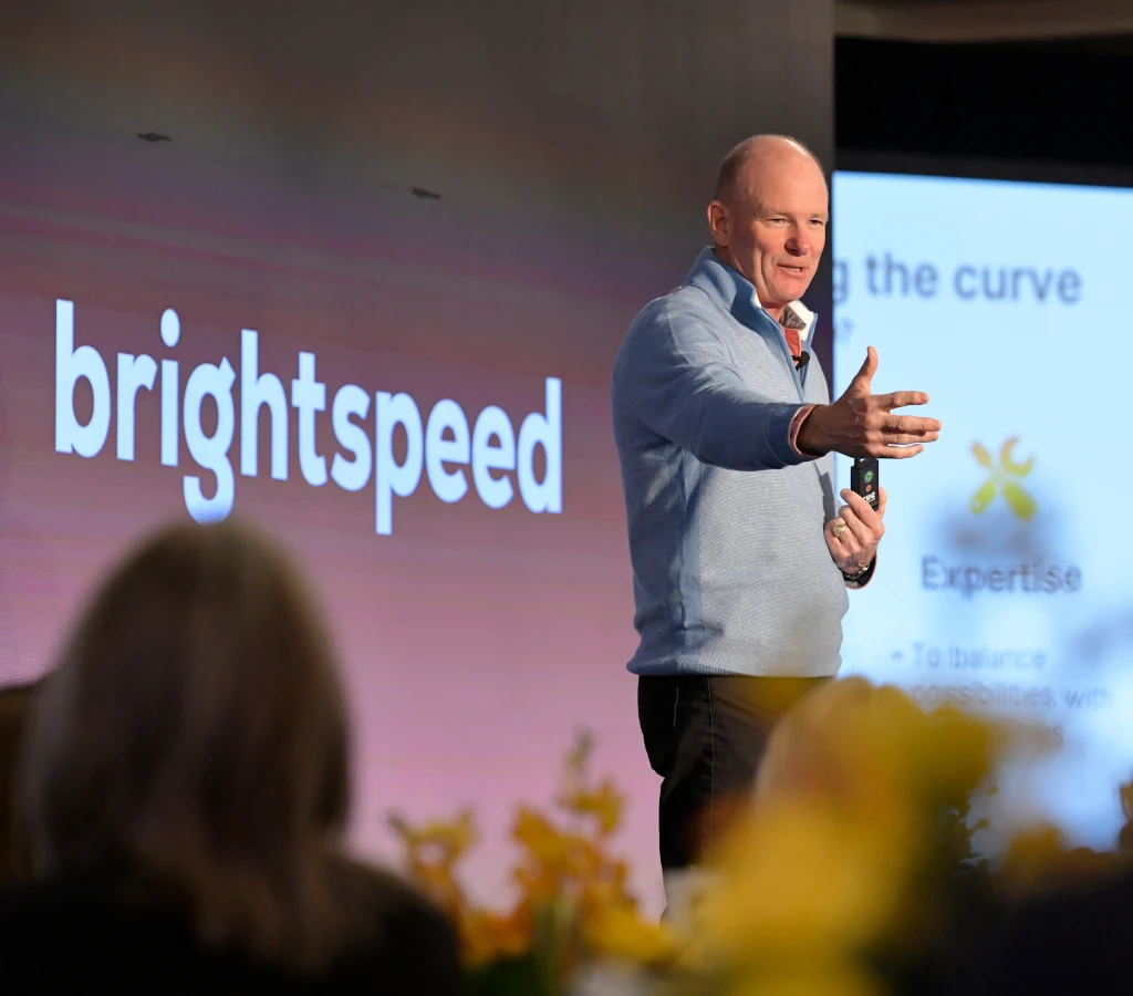 Brightspeed Chief Executive Officer, Bob Mudge, giving a speech.