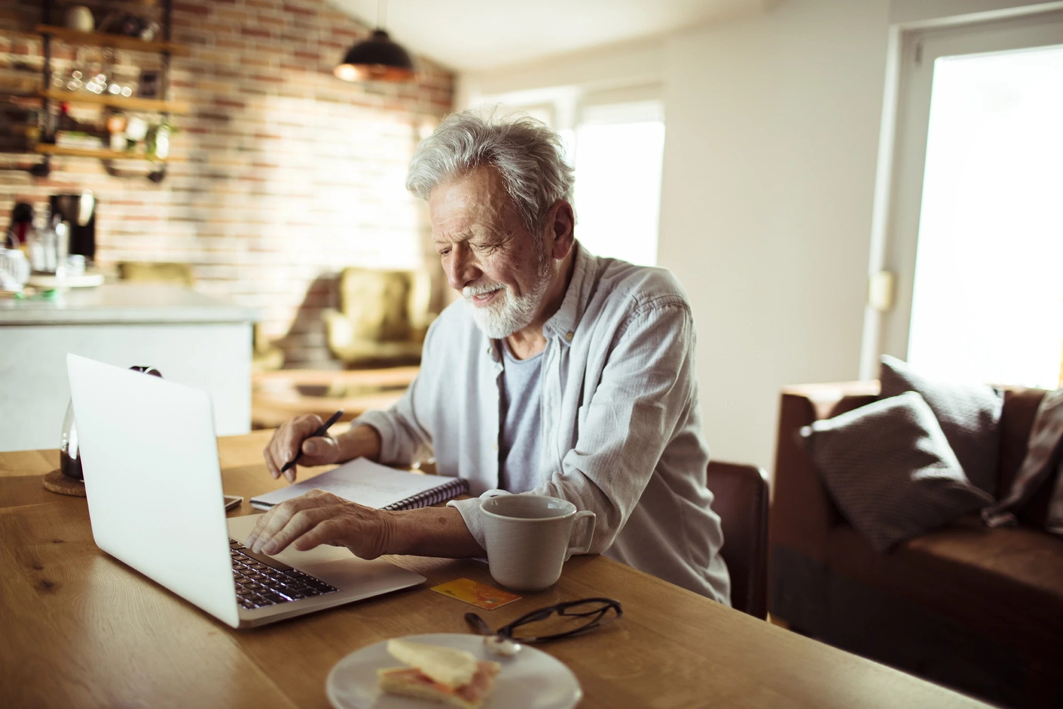 Older Man Looking at Laptop